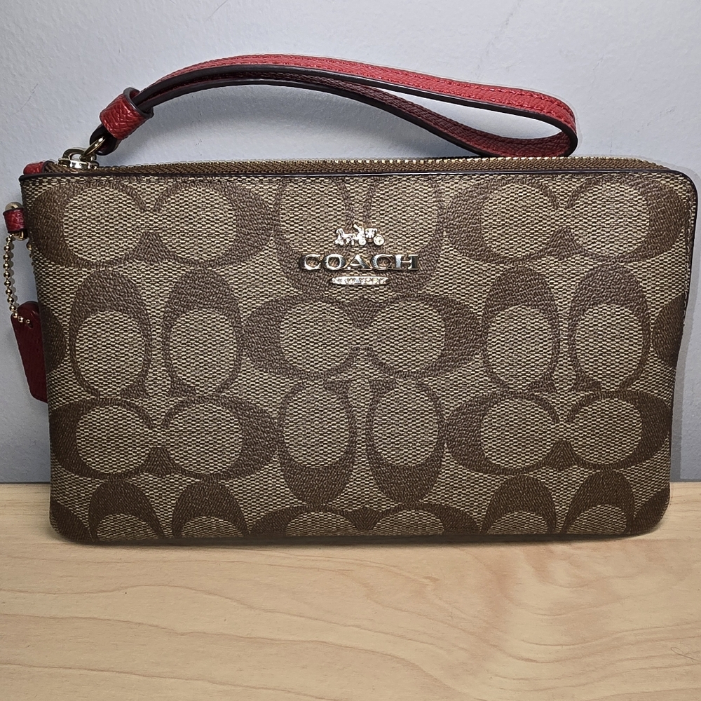 COACH C1748 Brown Signature Coated Canvas Wristlet with Red Strap **